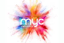 An explosion of powdered paint colours with myc network written in white over it