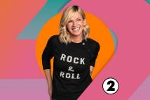 Smiling woman in black t-shirt with Rock and Roll written on it