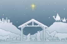 Pale blue night sky with silhouette of nativity scene 