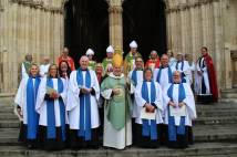 Archbishop Stephen stands with a group of lay ministers on the steps of York Minster