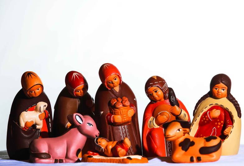 Carved painted wooden figures of the nativity scene