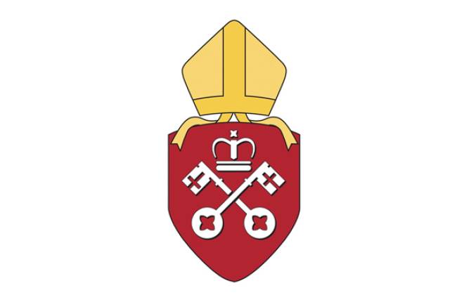 Red shield with white crossed keys and crown with gold mitre above