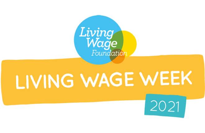 Blue circle with Living wage Foundation written inside it and Yellow banner with Living Wage Week written on it