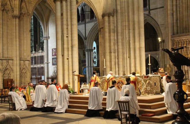 a picture of deacons being ordained in York Minster